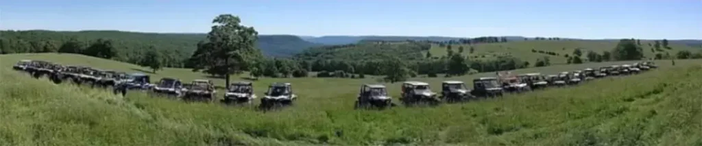 Panoramic view of parked four wheelers