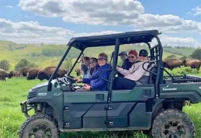 People on a four wheeler