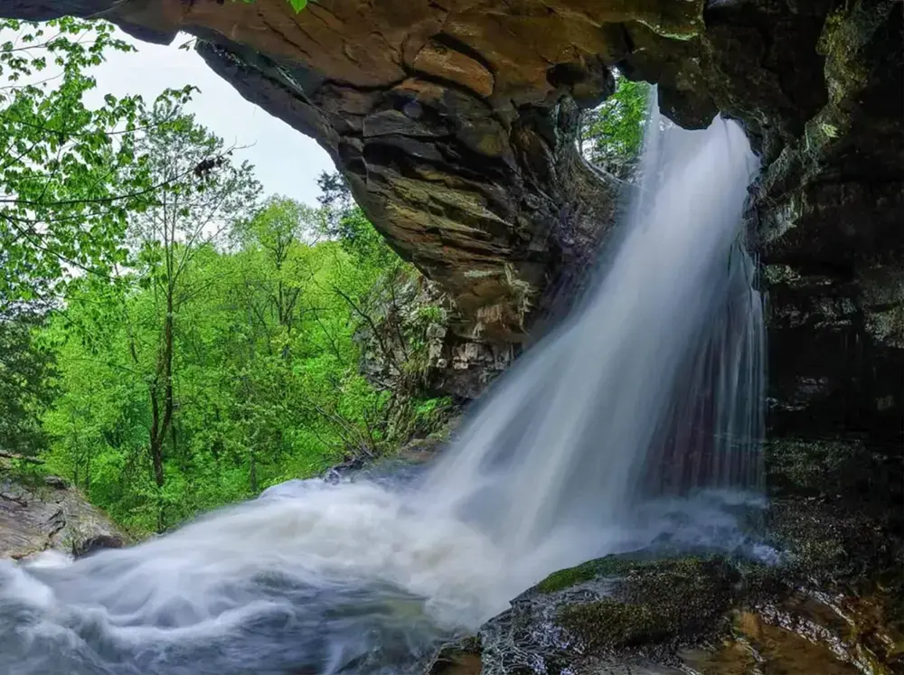 Water falling through a hole in a big rock